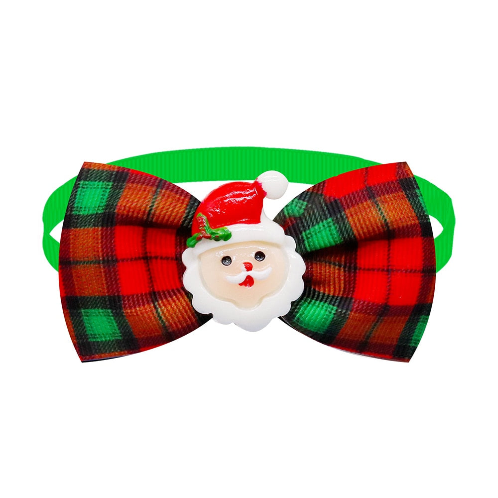  Red and green bowtie with a Santa charm. 