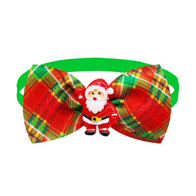Red, green, and yellow bowtie with a Santa charm. 